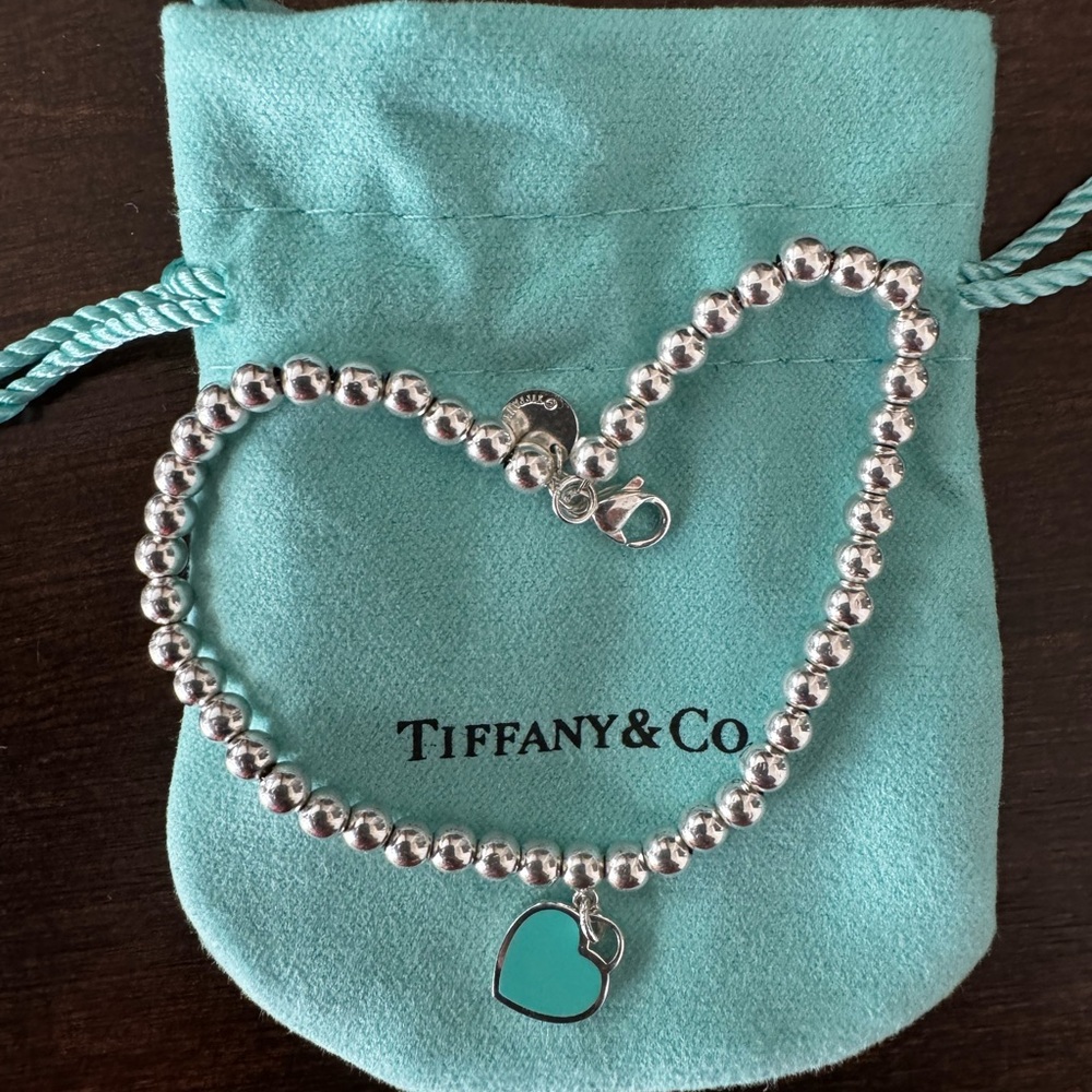 Tiffany & Co. Silver Beaded Bracelet with Blue Heart Charm